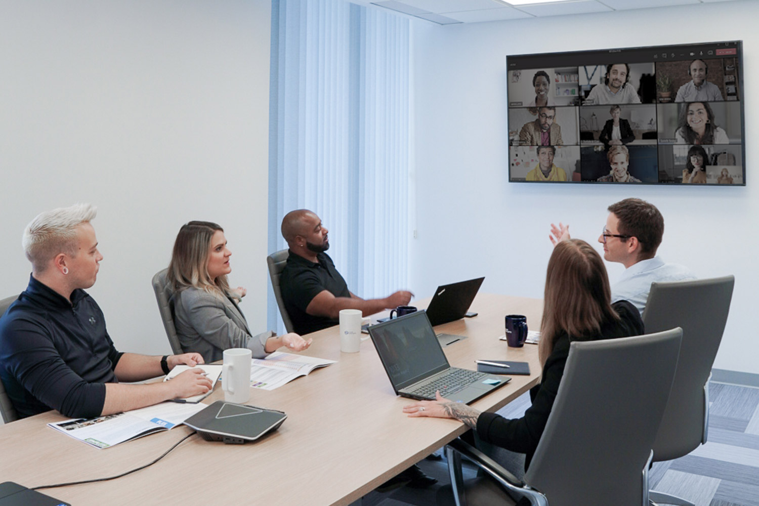Convergence Networks Winnipeg team in a conference call
