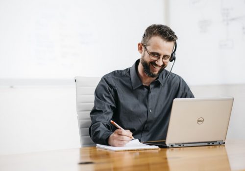 Employee using AI tools at work without supervision, highlighting data privacy risks